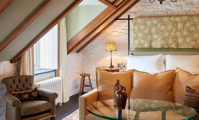 Hotel bedroom with seating area